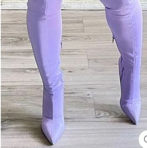 Thigh high purple boots